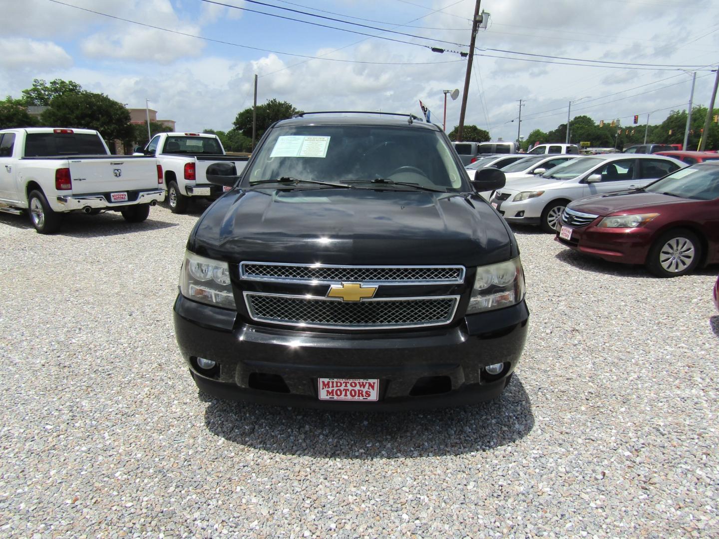 2014 Black /Tan Chevrolet Tahoe (1GNSCBE00ER) with an V8 engine, Automatic transmission, located at 15016 S Hwy 231, Midland City, AL, 36350, (334) 983-3001, 31.306210, -85.495277 - Photo#1